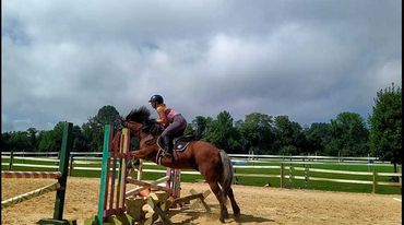 Man and Woman Riding Horses